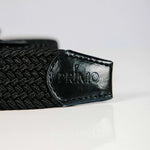 Black woven belt with 'PRIMO' logo on a white background