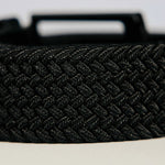 Black braided belt on a light background