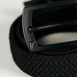 Black belt with a buckle on a light gray background