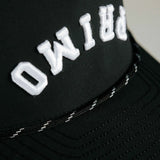 Primo embroidered logo on front of cap, close up details