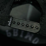 Close up detail of snapback cap