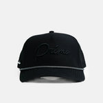 Black cap with 'Primo' embroidery on a white background