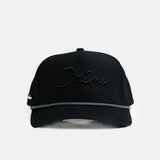Black cap with 'Primo' embroidery on a white background