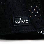 Black textured product with a Primo logo patch on a white background
