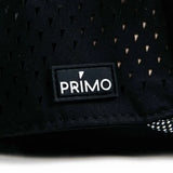 Black textured product with a Primo logo patch on a white background