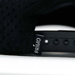 Close-up of a black seat with 'Primo' branding on a white background