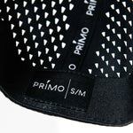 Black and white patterned product with 'Primo' branding on a white background