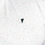 White shirt with colorful speckles and a black triangle design on a white background