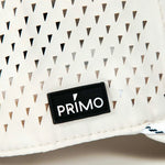 Primo rubber logo label sewn to side of cap