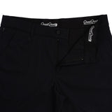 Close-up of black pants with 'Good Good' branding on waistband and pocket.