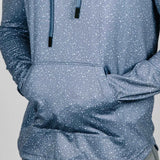 Blue patterned hoodie with a visible brand logo on a gray background