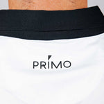 White shirt with 'PRIMO' logo on a plain background