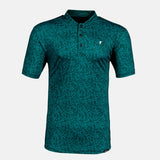 Teal patterned polo shirt on a light gray background