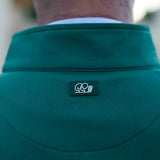 Green jacket with a logo on the chest area