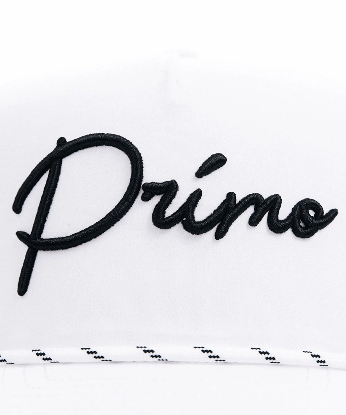 Embroidered word 'Primo' on a white background