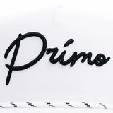 Embroidered word 'Primo' on a white background