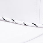 Close up detail of black/white thin rope detail on front of hat
