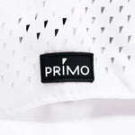 Close up detail of rubber Primo label sewn to hat