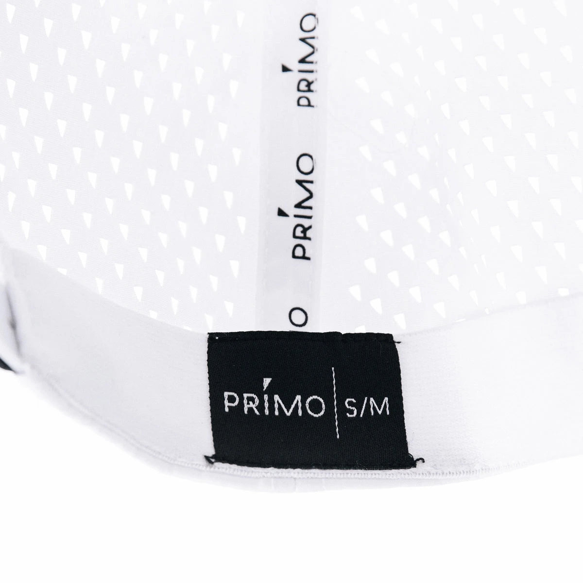 Close-up of a white cap interior with 'Primo' branding and size label on a white background