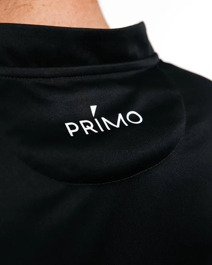 Black polo with 'Primo' logo on the back of it