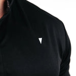 Black athletic shirt with a small white logo on a white background