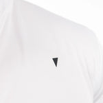 White golf polo with a black triangle logo on a white background