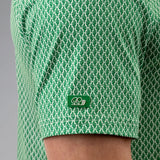Green patterned shirt with a logo on a gray background