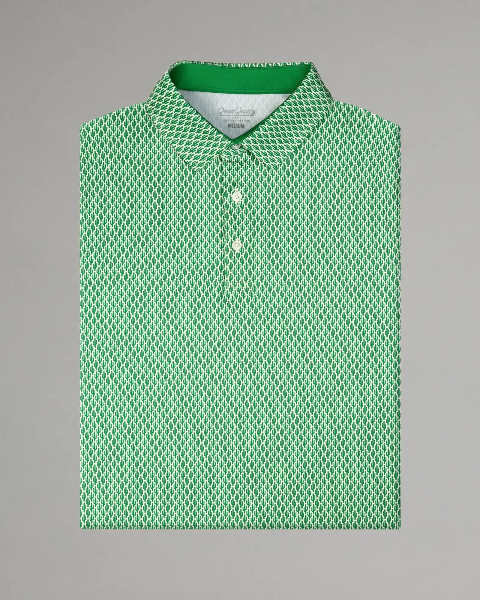 Green patterned polo shirt on a gray background