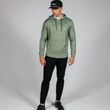 Man wearing green hoodie with Primo logo