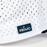 Close up of Primo rubber label sewn to outside of hat