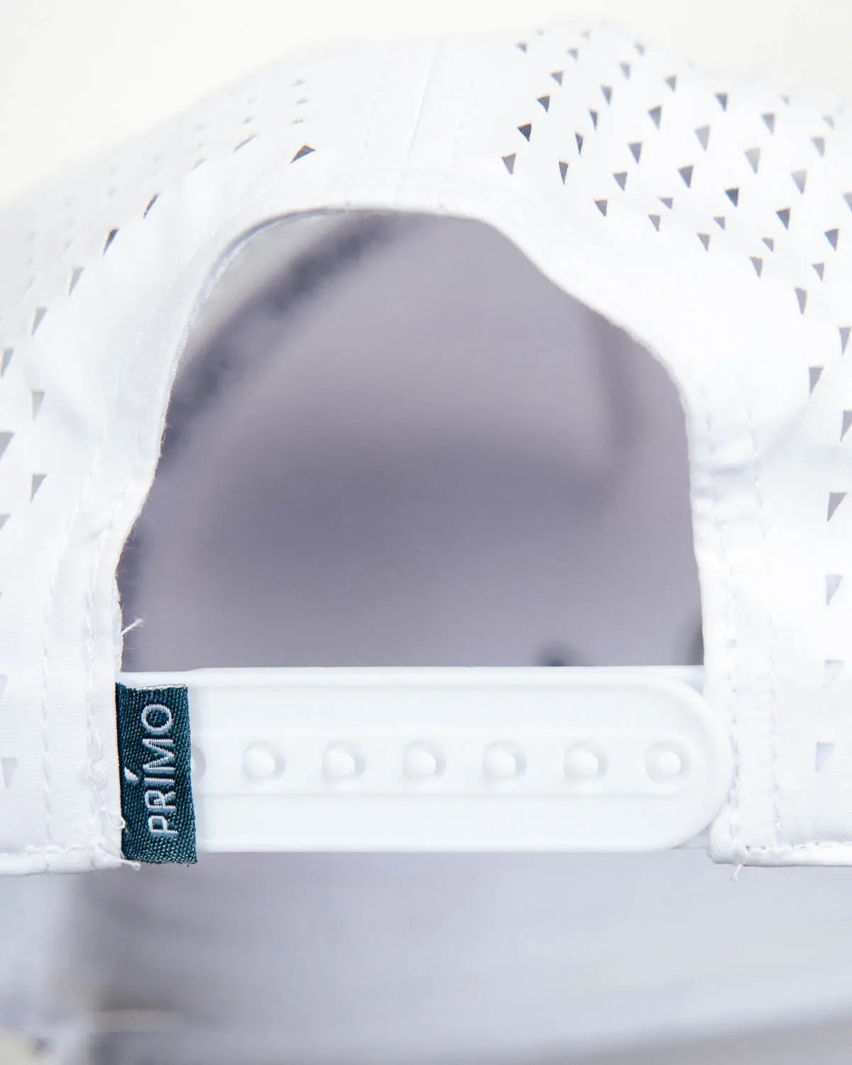 Back view of Primo Golf hat with snapback details