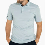 Light blue polo shirt worn by a person on a white background