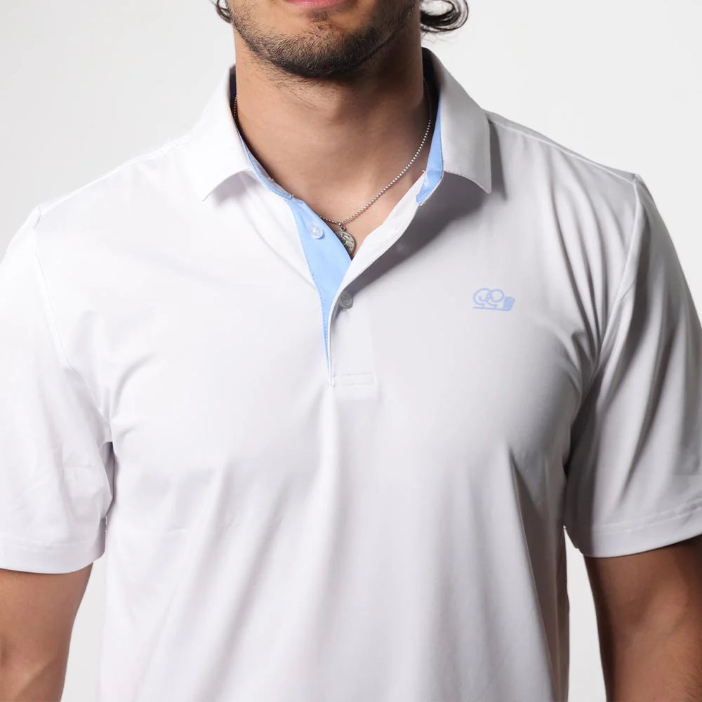 Man wearing a light gray polo shirt with a collar, brand logo visible.